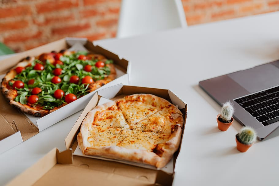 Desk pizza workplace office workspace indoor